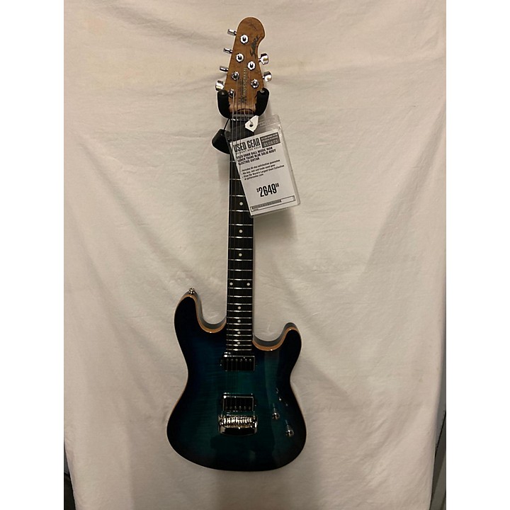 Used Ernie Ball Music Man SABER Solid Body Electric Guitar Trans Blue