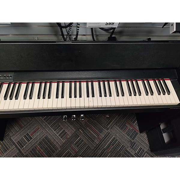 Used Roland F140R Digital Piano