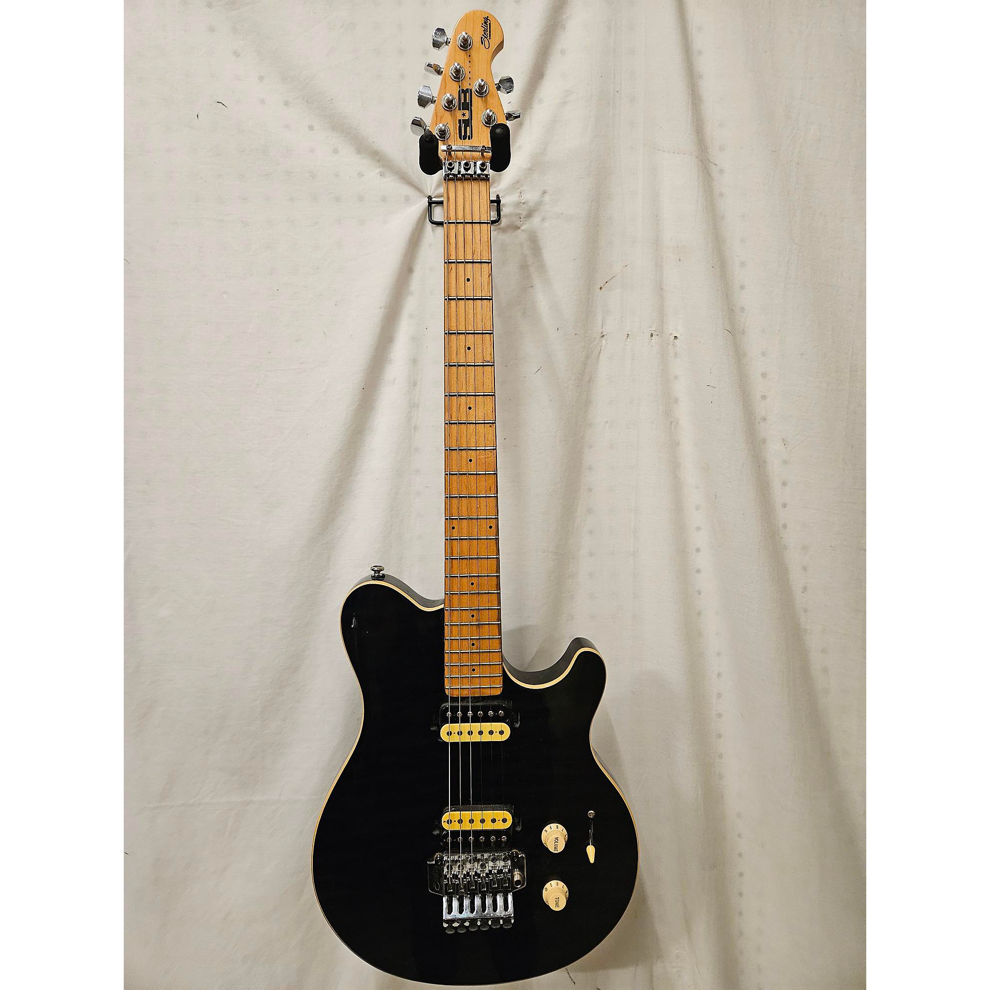 Used Sterling by Music Man Sub AX3 Axis Solid Body Electric Guitar Trans  Black | Guitar Center