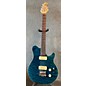 Used Ernie Ball Music Man Used Ernie Ball Music Man Axis Super Sport Trans Blue Solid Body Electric Guitar thumbnail