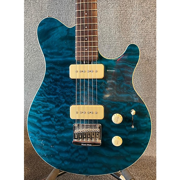 Used Ernie Ball Music Man Used Ernie Ball Music Man Axis Super Sport Trans Blue Solid Body Electric Guitar