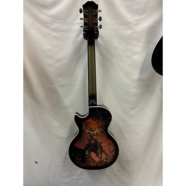 Used Epiphone Used Epiphone Adam Jones Les Paul Custom Art Collection "The Berserker" By Frazetta Silverburst Solid Body E...