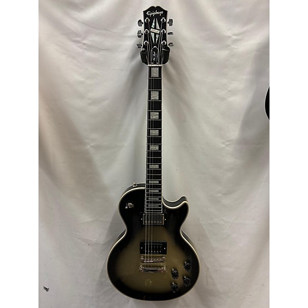 Used Epiphone Used Epiphone Adam Jones Les Paul Custom Art Collection "The Berserker" By Frazetta Silverburst Solid Body E...