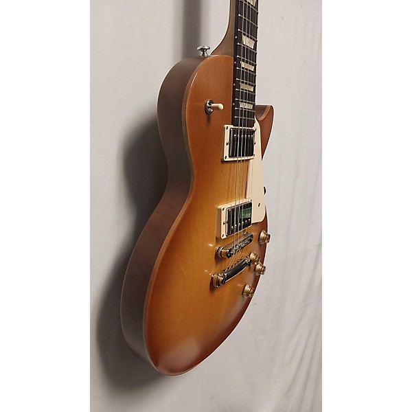 Used Gibson Used Gibson Les Paul Tribute Honey Burst Solid Body Electric Guitar