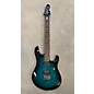 Used Sterling by Music Man Used Sterling By Music Man JP100D Trans Green Solid Body Electric Guitar thumbnail