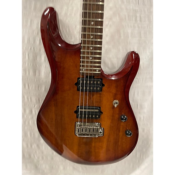 Used Sterling by Music Man Used Sterling By Music Man JP100D Natural Solid Body Electric Guitar