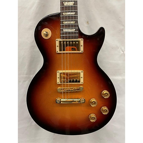 Used Gibson Used 2005 Gibson Les Paul Studio Honey Burst Solid Body Electric Guitar