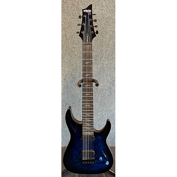 Used Schecter Guitar Research Used Schecter Guitar Research Omen Elite 7str See-Thru Blue Burst Solid Body Electric Guitar