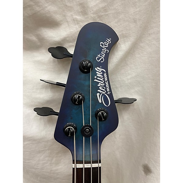 Used Sterling by Music Man Used Sterling By Music Man Ray34 Trans Blue Electric Bass Guitar