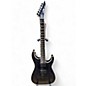 Used ESP Used ESP LTD MH1000 with Evertune Trans Black Solid Body Electric Guitar thumbnail