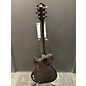 Used Washburn Used Washburn WI66ANC TRANS EBONY QUILT Solid Body Electric Guitar