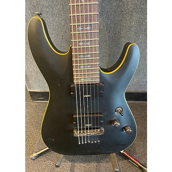 Used Schecter Guitar Research Used Schecter Guitar Research Demon 7 String Black Solid Body Electric Guitar