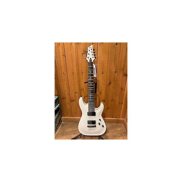 Used Used 2010s Schecter Guitar Research Demon 7 String Vintage White Solid Body Electric Guitar