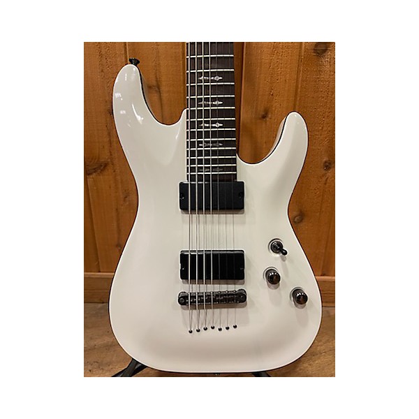 Used Used 2010s Schecter Guitar Research Demon 7 String Vintage White Solid Body Electric Guitar