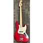 Used Squier Used Squier Affinity Jazz Bass Metallic Red Electric Bass Guitar thumbnail