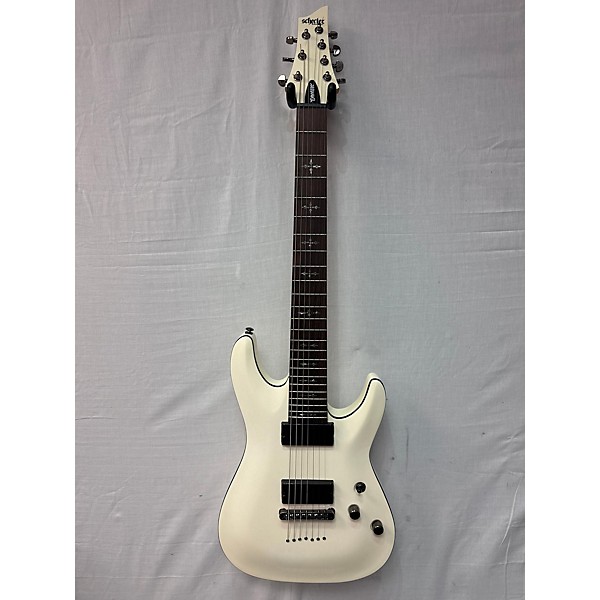 Used Schecter Guitar Research Used Schecter Guitar Research Demon 7 String White Solid Body Electric Guitar