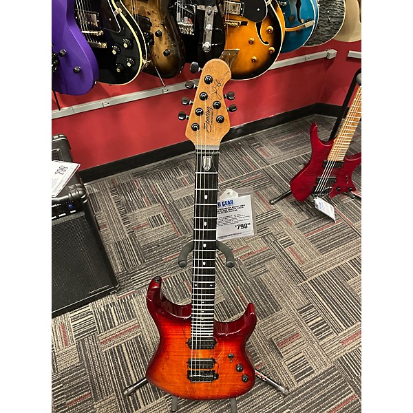 Used Sterling by Music Man Used Sterling By Music Man JP150D Blood Orange Solid Body Electric Guitar