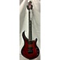 Used Ernie Ball Music Man Used Ernie Ball Music Man Majesty Blood Orange Burst Solid Body Electric Guitar thumbnail