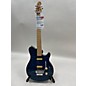 Used Sterling by Music Man Used Sterling By Music Man SUB AX4 FLOYD ROSE TRANS BLUE QUILT TOP Solid Body Electric Guitar thumbnail