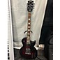 Used Gibson Used Gibson Les Paul Studio Trans Red Solid Body Electric Guitar thumbnail