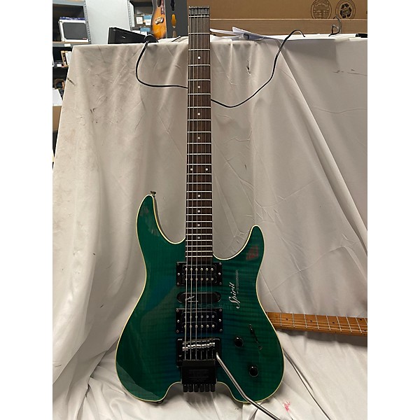 Used Steinberger Used 2001 Steinberger SPIRIT GU7R DELUXE Trans Green Solid Body Electric Guitar