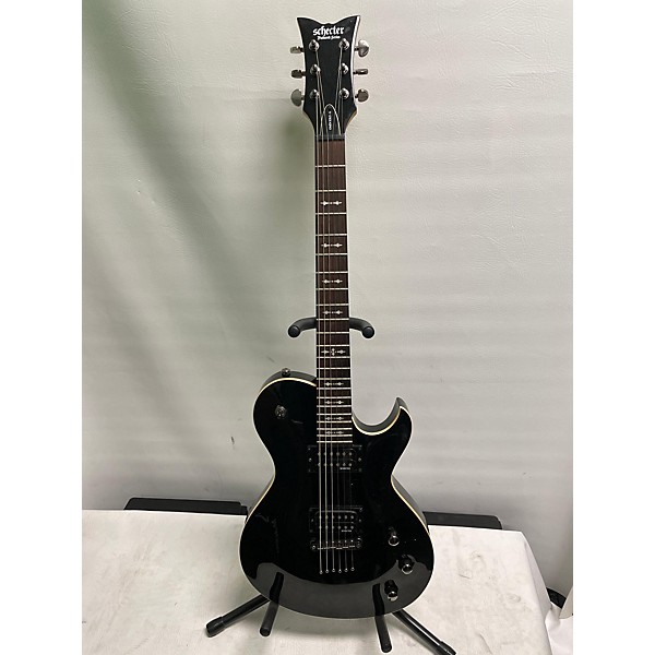 Used Schecter Guitar Research Used Schecter Guitar Research Omen 6 Black And Gold Solid Body Electric Guitar