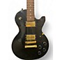 Used Gibson Used Gibson Les Paul Studio Black and Gold Solid Body Electric Guitar