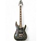 Used Schecter Guitar Research Omen Extreme 6 Floyd Rose Trans Black Solid Body Electric Guitar thumbnail