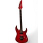 Used 2000s Ibanez RG1420F 10th Anniversary Trans Red Solid Body Electric Guitar thumbnail