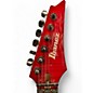 Used 2000s Ibanez RG1420F 10th Anniversary Trans Red Solid Body Electric Guitar