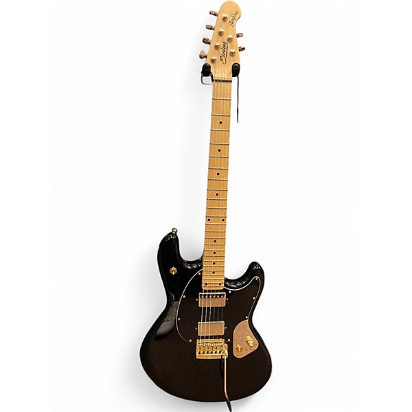 Used Sterling by Music Man Jared Dines Artist Series Stingray Black and Gold Solid Body Electric Guitar