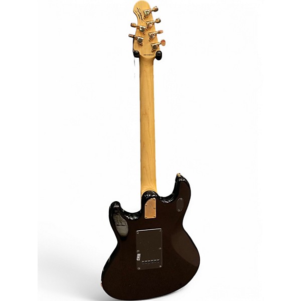 Used Sterling by Music Man Jared Dines Artist Series Stingray Black and Gold Solid Body Electric Guitar