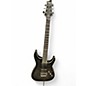 Used Schecter Guitar Research Hellraiser C1 Hybrid Trans Black Solid Body Electric Guitar thumbnail