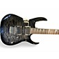 Used 2010 Ibanez RG4EXQM1 Trans Black Solid Body Electric Guitar