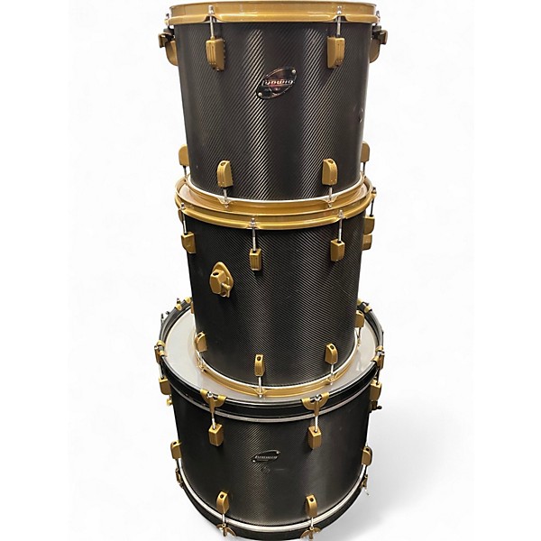 Used 2020s Ludwig 7 Piece 7 piece rocker drum set black carbon fiber wrap finish with gold hardware Drum Kit
