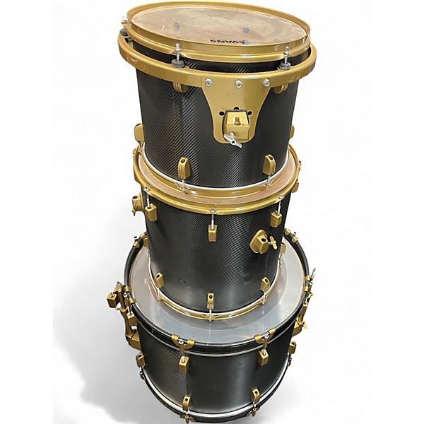 Used 2020s Ludwig 7 Piece 7 piece rocker drum set black carbon fiber wrap finish with gold hardware Drum Kit