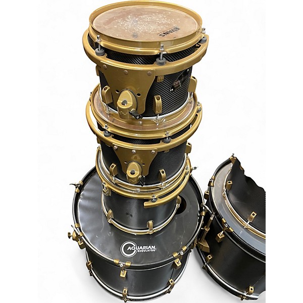 Used 2020s Ludwig 7 Piece 7 piece rocker drum set black carbon fiber wrap finish with gold hardware Drum Kit