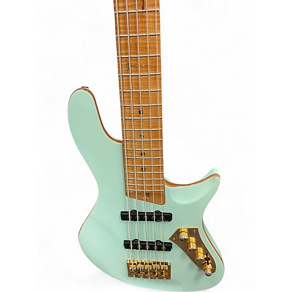 Used Warrior BELA Turquoise Electric Bass Guitar