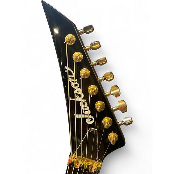 Used Jackson Jackson Pro Series Signature Mark Heylmun Rhoads RR24-7 Black and Gold Solid Body Electric Guitar