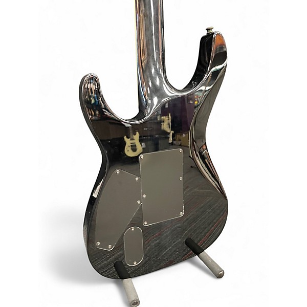 Used ESP LTD M1000 Deluxe Trans Black Solid Body Electric Guitar