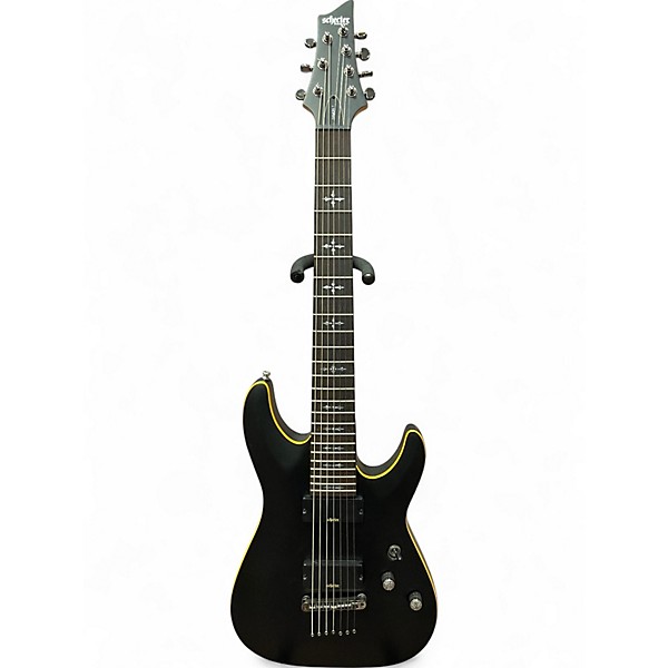 Used Schecter Guitar Research Demon 7 String Black and Gold Solid Body Electric Guitar