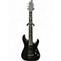 Used Schecter Guitar Research Demon 7 String Black and Gold Solid Body Electric Guitar thumbnail