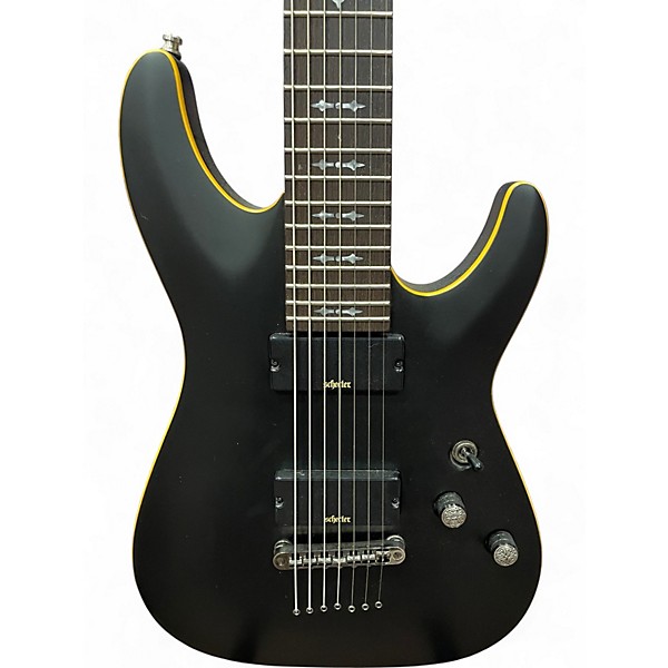 Used Schecter Guitar Research Demon 7 String Black and Gold Solid Body Electric Guitar