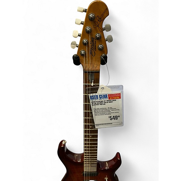 Used Sterling by Music Man JP150 Orange Solid Body Electric Guitar