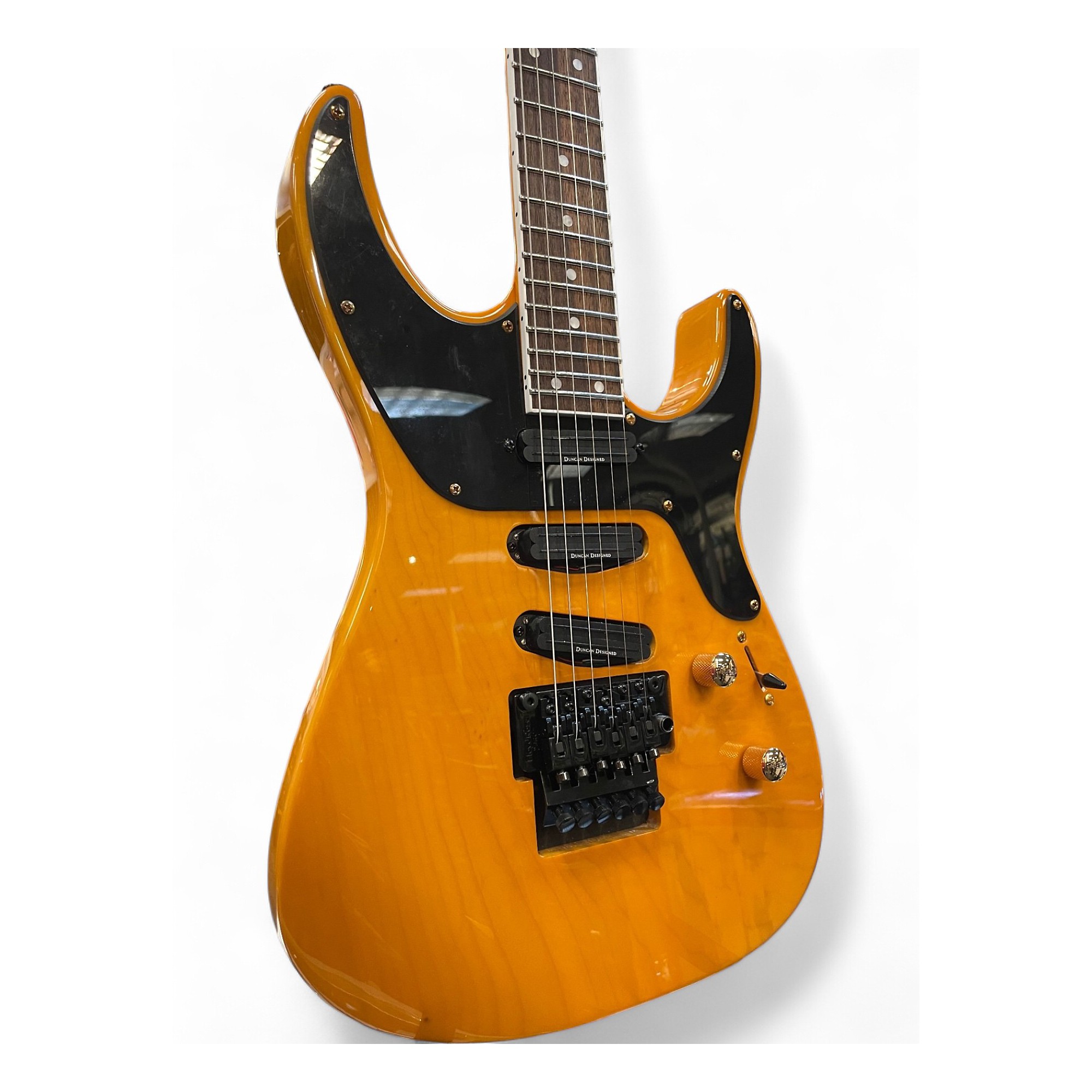 Used Jackson SL4X Transparent Butterscotch Solid Body