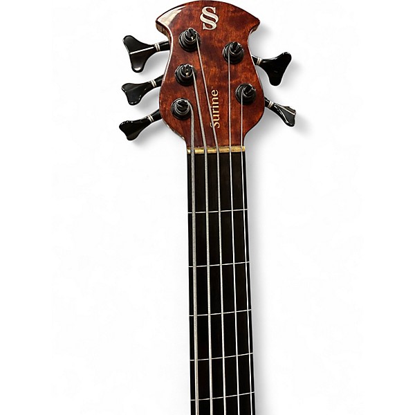 Used 2012 Surine Quest NTVII Fretless Clear Gloss Polyester Electric Bass Guitar