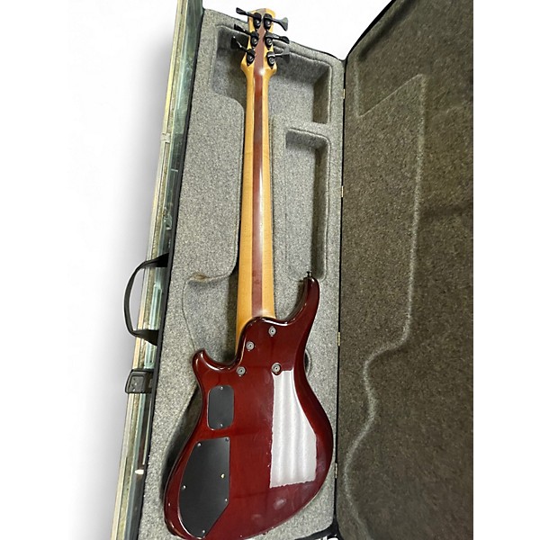Used Roscoe SKB3006 Milky Honey Burst Electric Bass Guitar