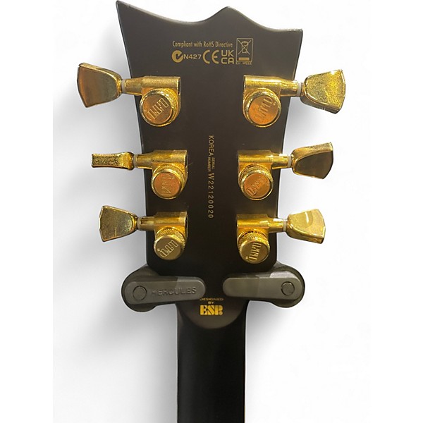 Used Ltd EC1000 Deluxe Black and Gold Solid Body Electric Guitar