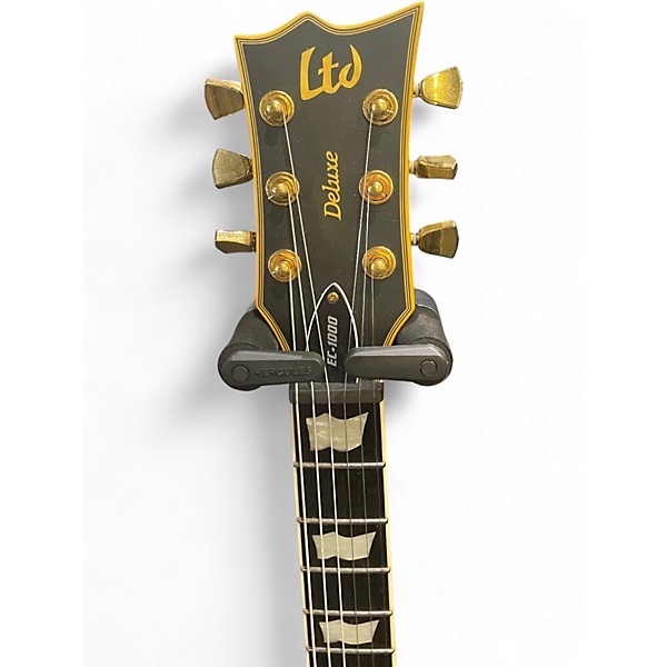Used Ltd EC1000 Deluxe Black and Gold Solid Body Electric Guitar
