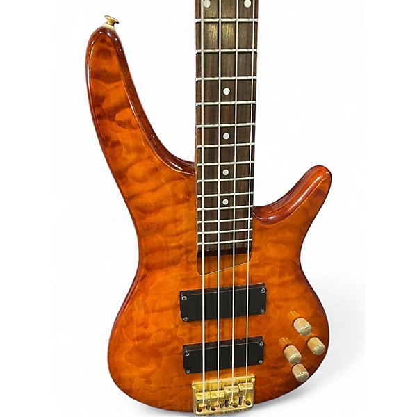 Used Carlo Robelli Bass 4 String 24 Fret Quilted Amber Electric Bass Guitar